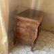 Curved commode with three drawers in light wood, Louis XV style.