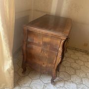 Curved commode with three drawers in light wood, Louis XV style.
