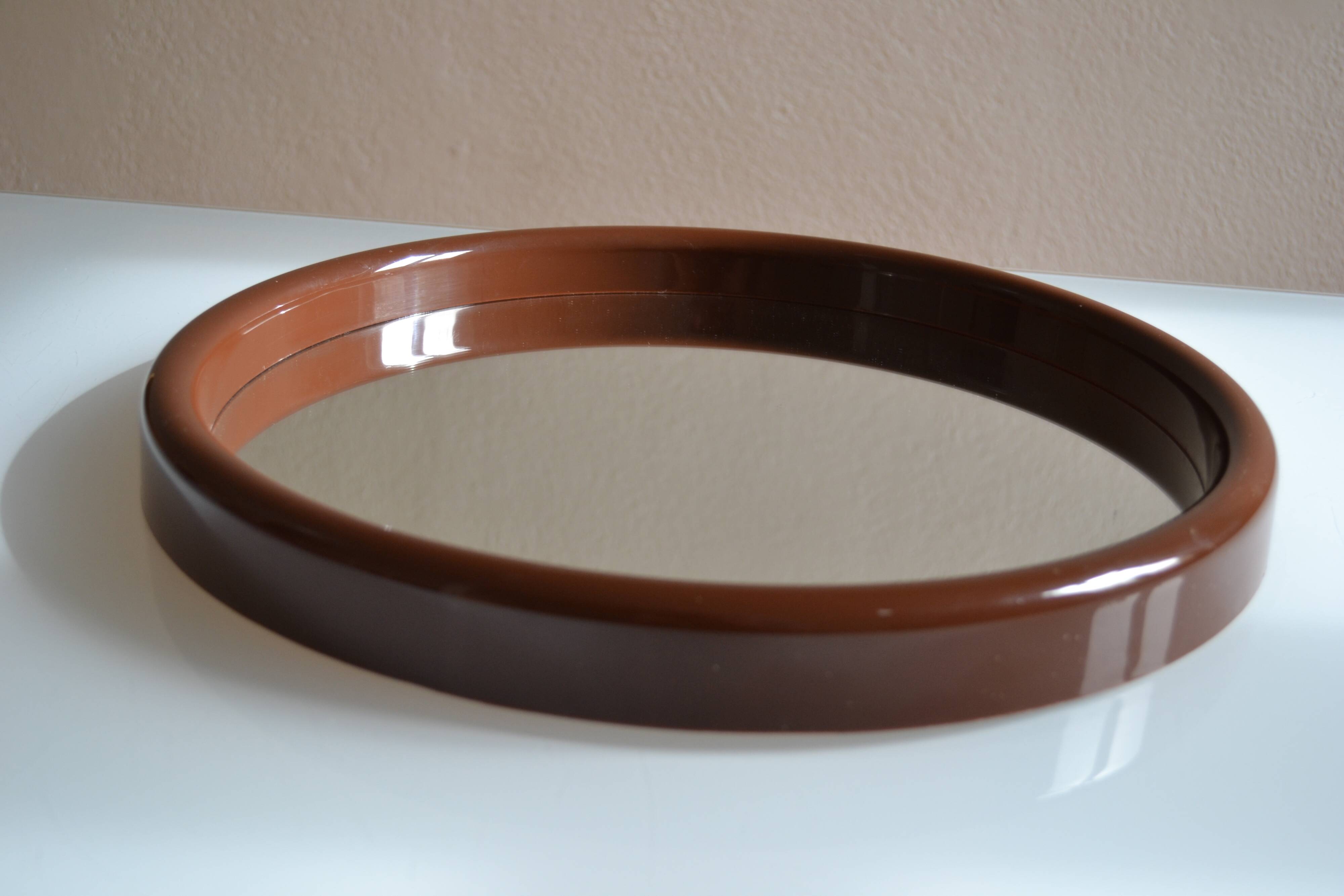 Scandinavian round mirror from the 70s brown plastic Finnmirror made in Finland