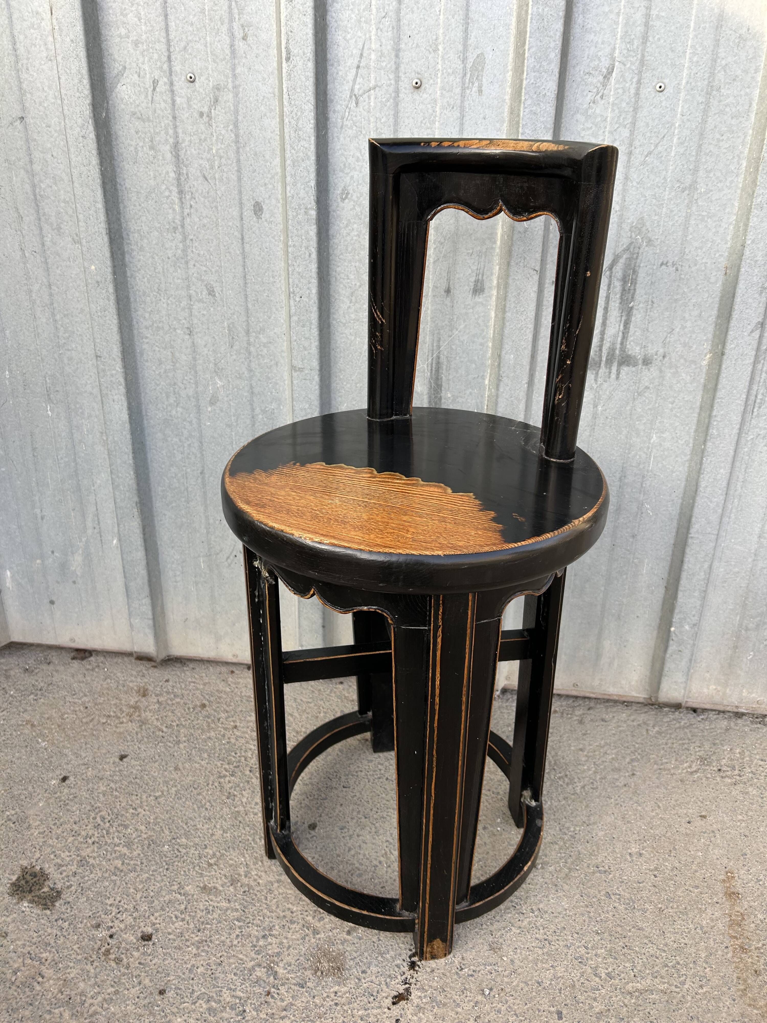 Antique Asian chair made of solid wood