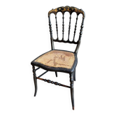 Chaise Napoléon III en bois noir et doré et cannage