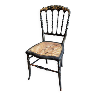 Chaise Napoléon III en bois noir et doré et cannage