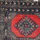 Tapis vintage fait main Lahore en laine rouge (45cm x 58cm) – Années 1970