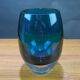 Plat en verre couleur bleu vert de forme ogive