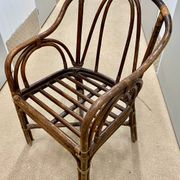 Vintage rattan armchair (1960s)