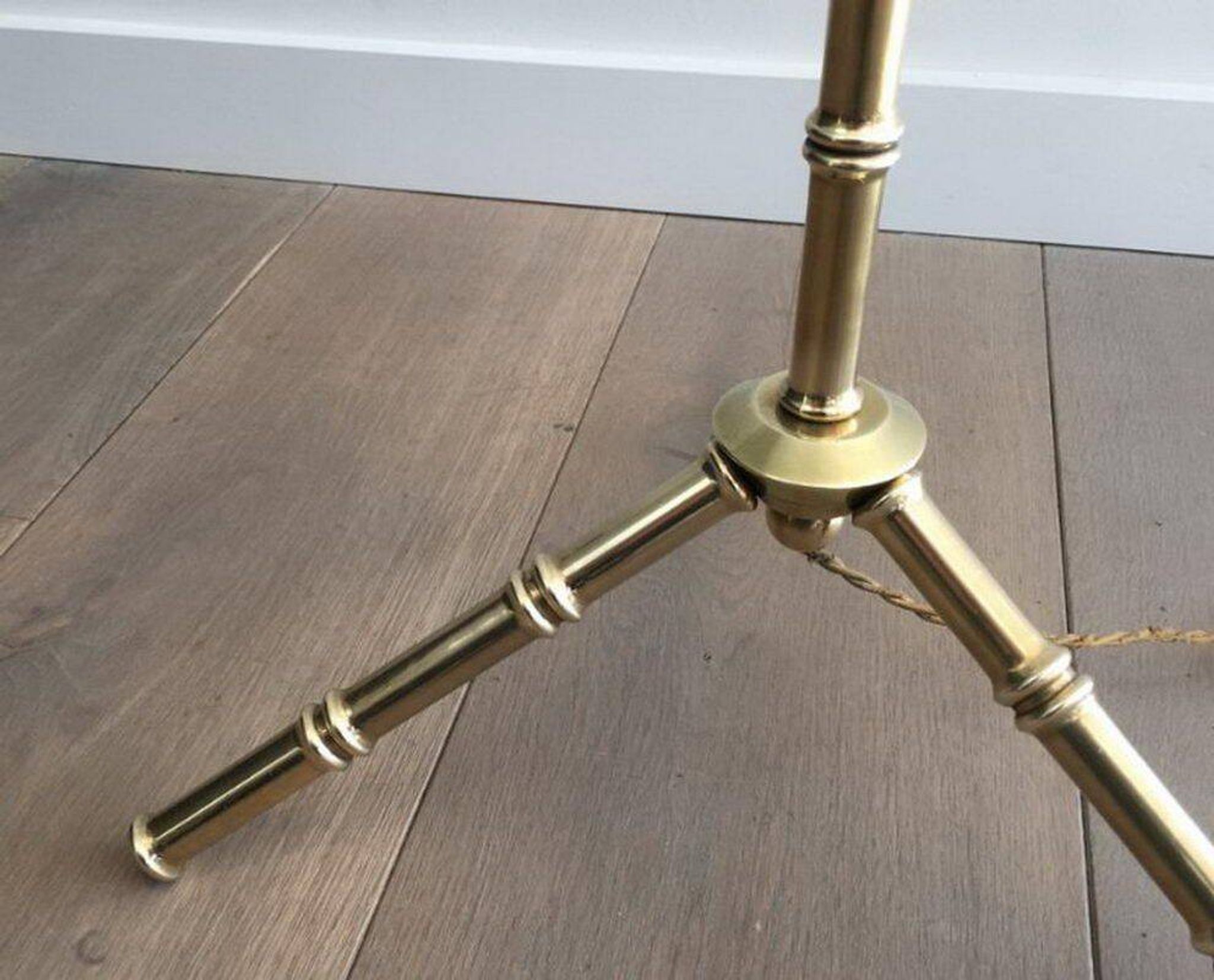 Floor lamp in faux-bamboo style, made of bronze and brass by Jacques Adnet