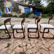 Four vintage Baumann sled chairs from the 1960s 1970s.