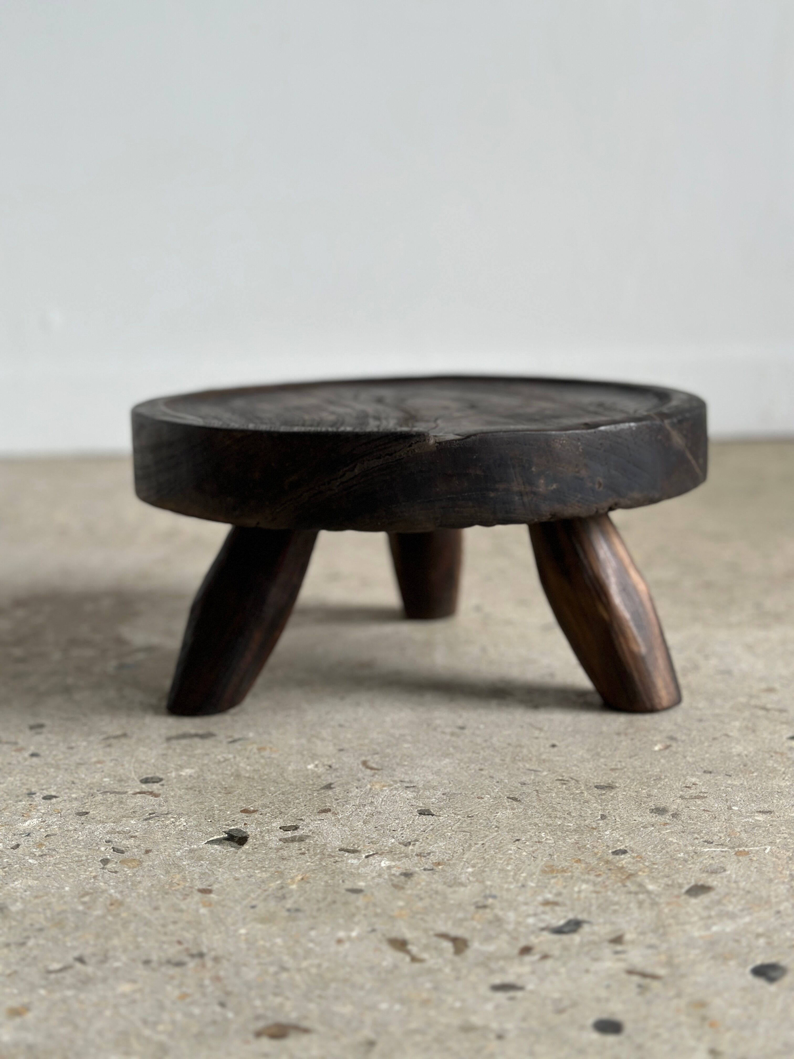 Small tripod stool low in dark brown upcycled teak
