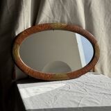 Small oval Art Deco mirror in brown and gold 33x54.