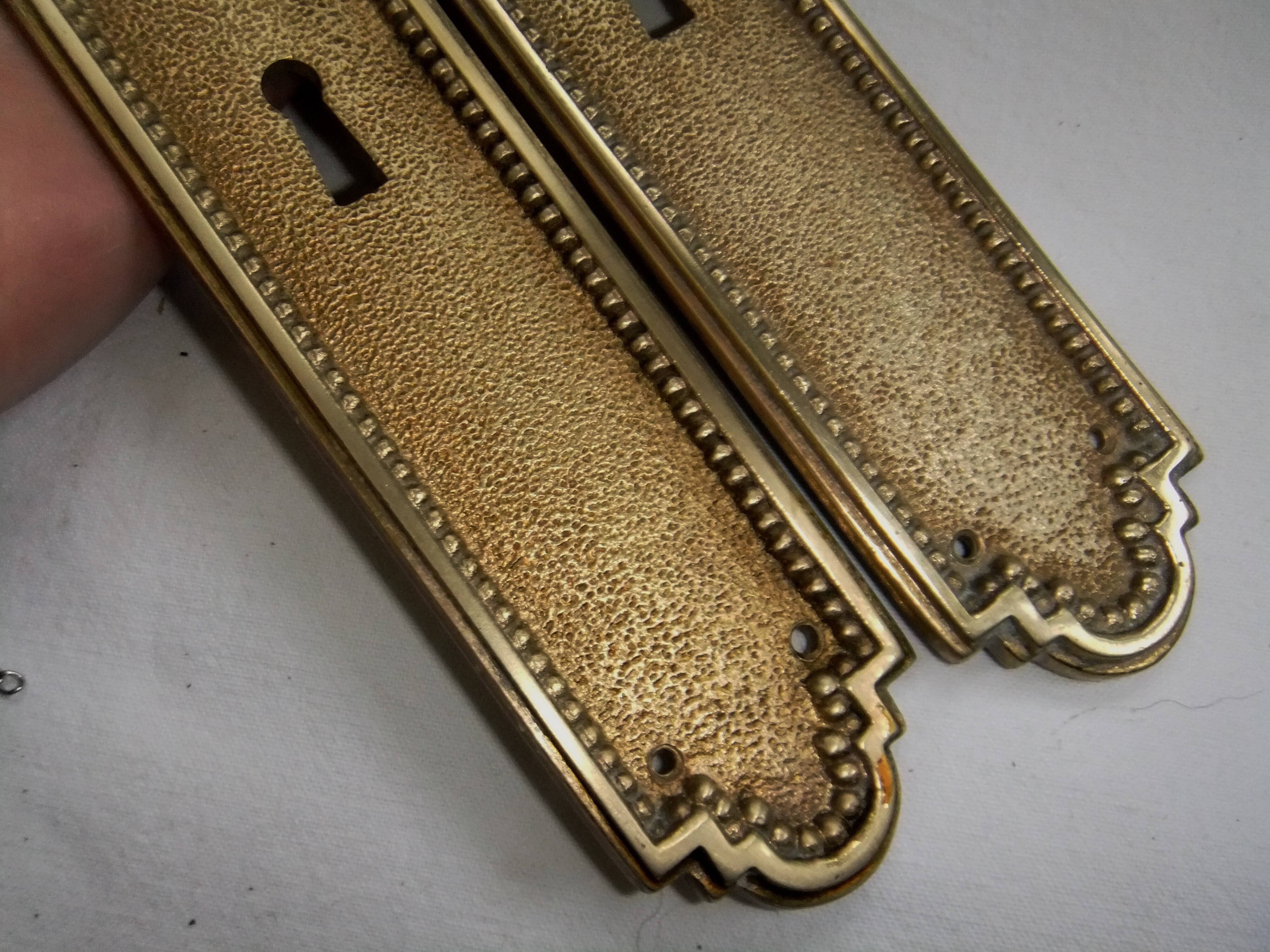 Pair of Louis XVI style beaded bronze door handles
