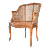 Louis XV style caned bergère armchair