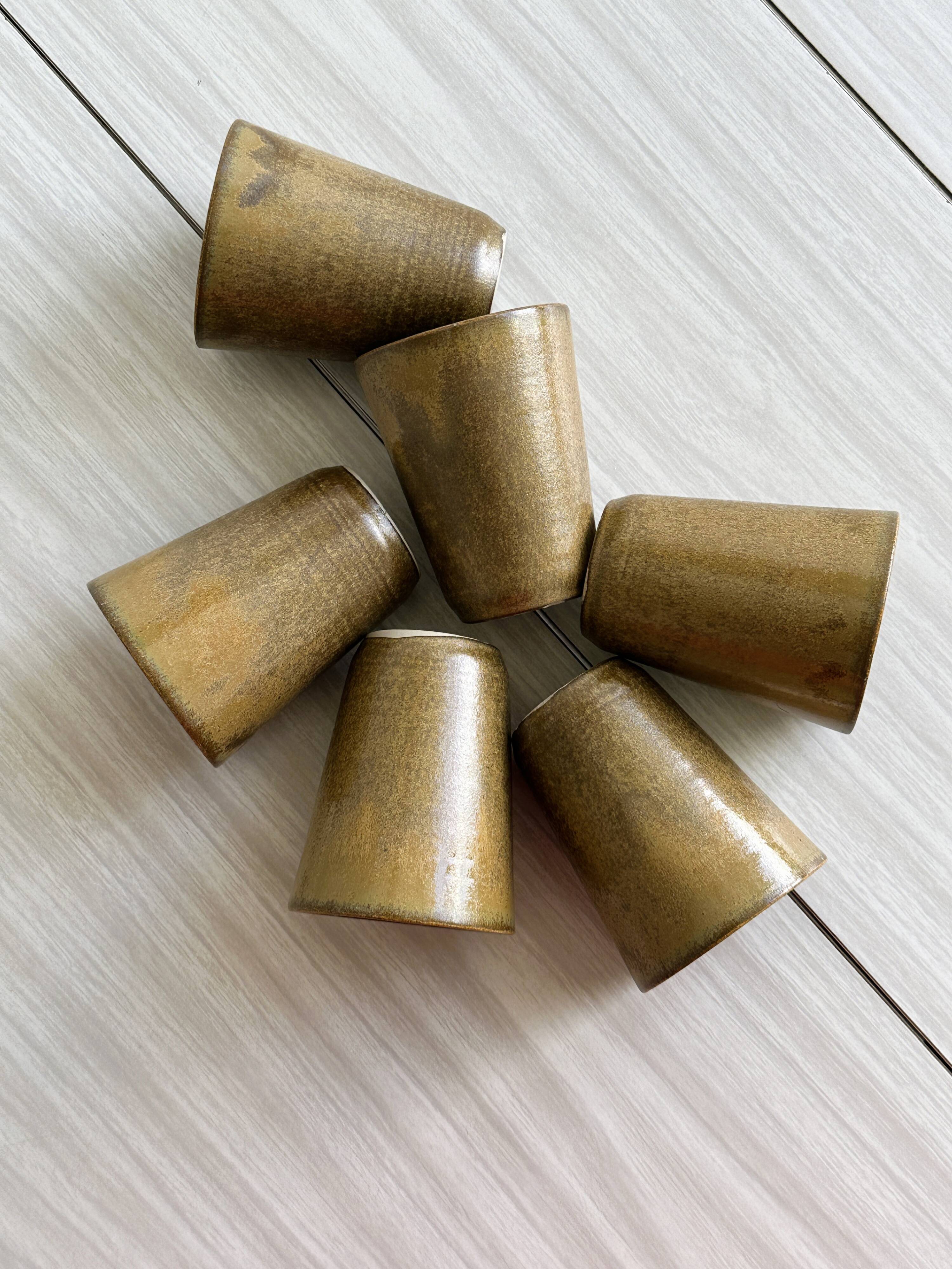 6 Digoin ceramic mugs.
