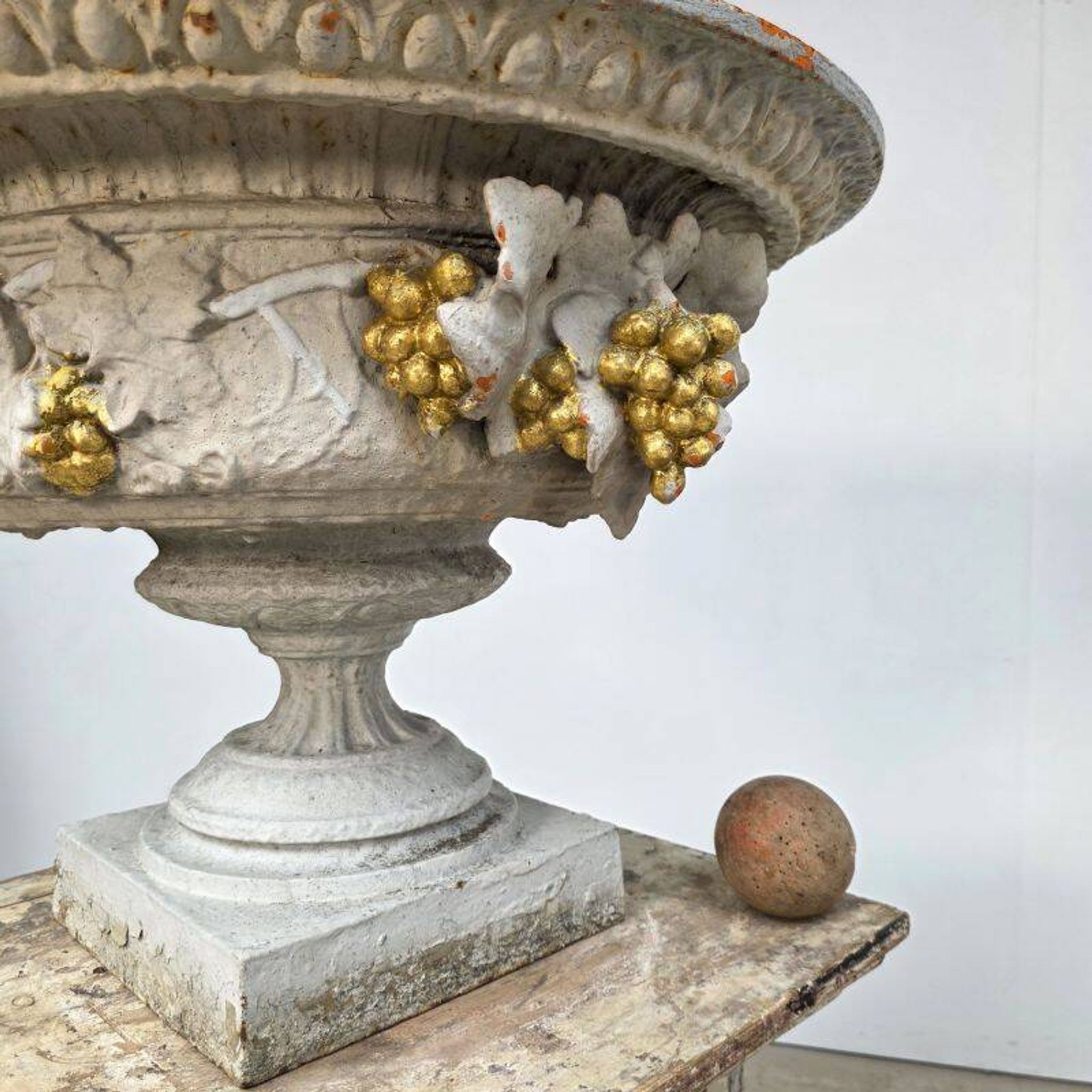 Large pair of 19th-century cast iron basins with vine decoration.