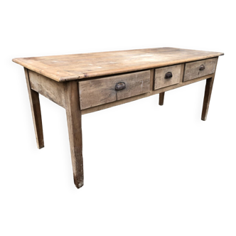 Antique solid cherry farm table with 3 front drawers.