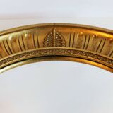 Sun mirror in carved gilded wood, Empire style, 60s.