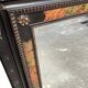 Mirror with painted wooden frame