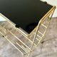End table, Erdecor magazine holder in gold metal and black glass