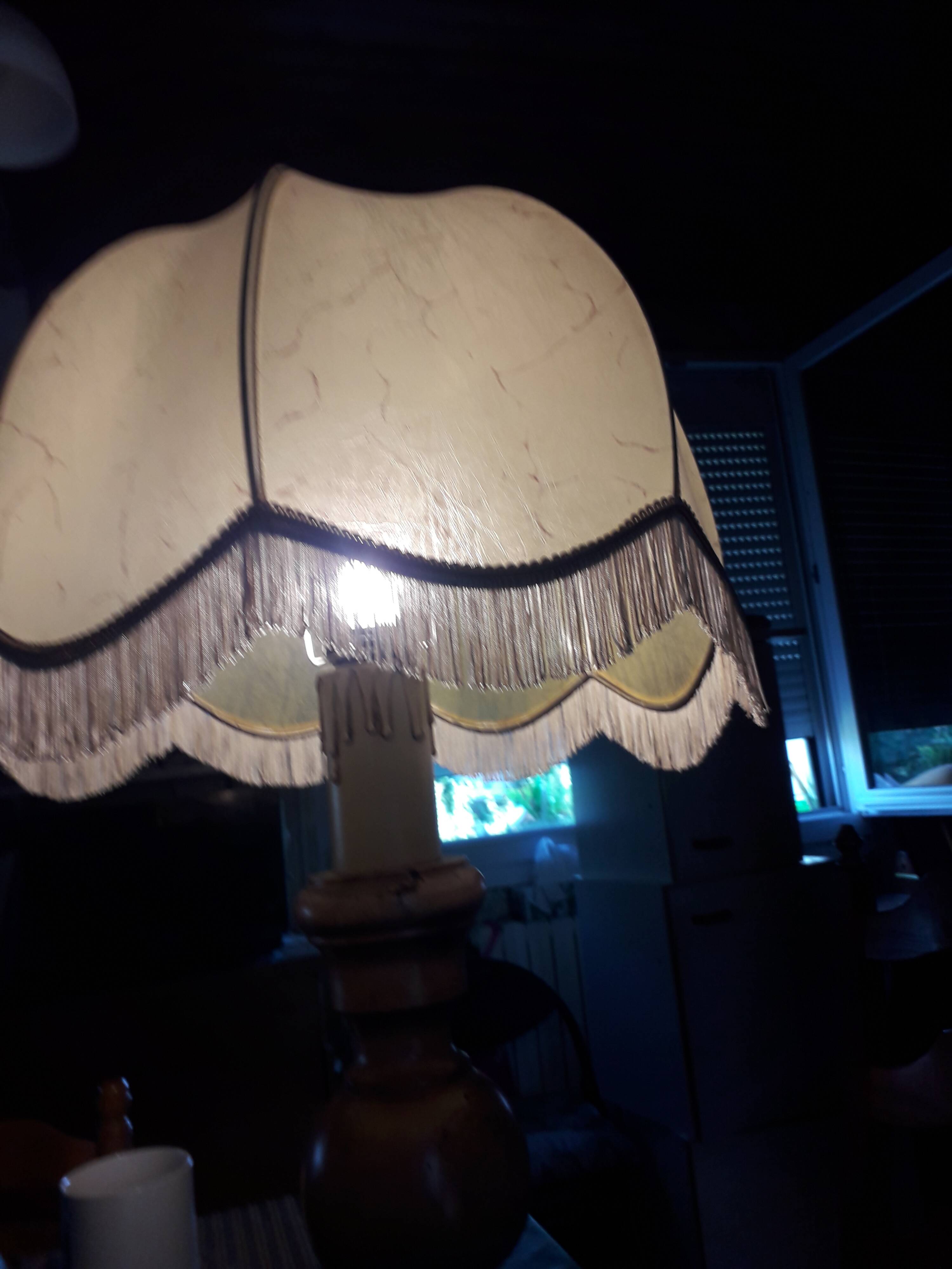 Turned wood table lamp with “skin” shade