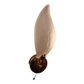 Murano glass wall light in the shape of a leaf.