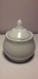 Set of 4 small covered pots in white porcelain