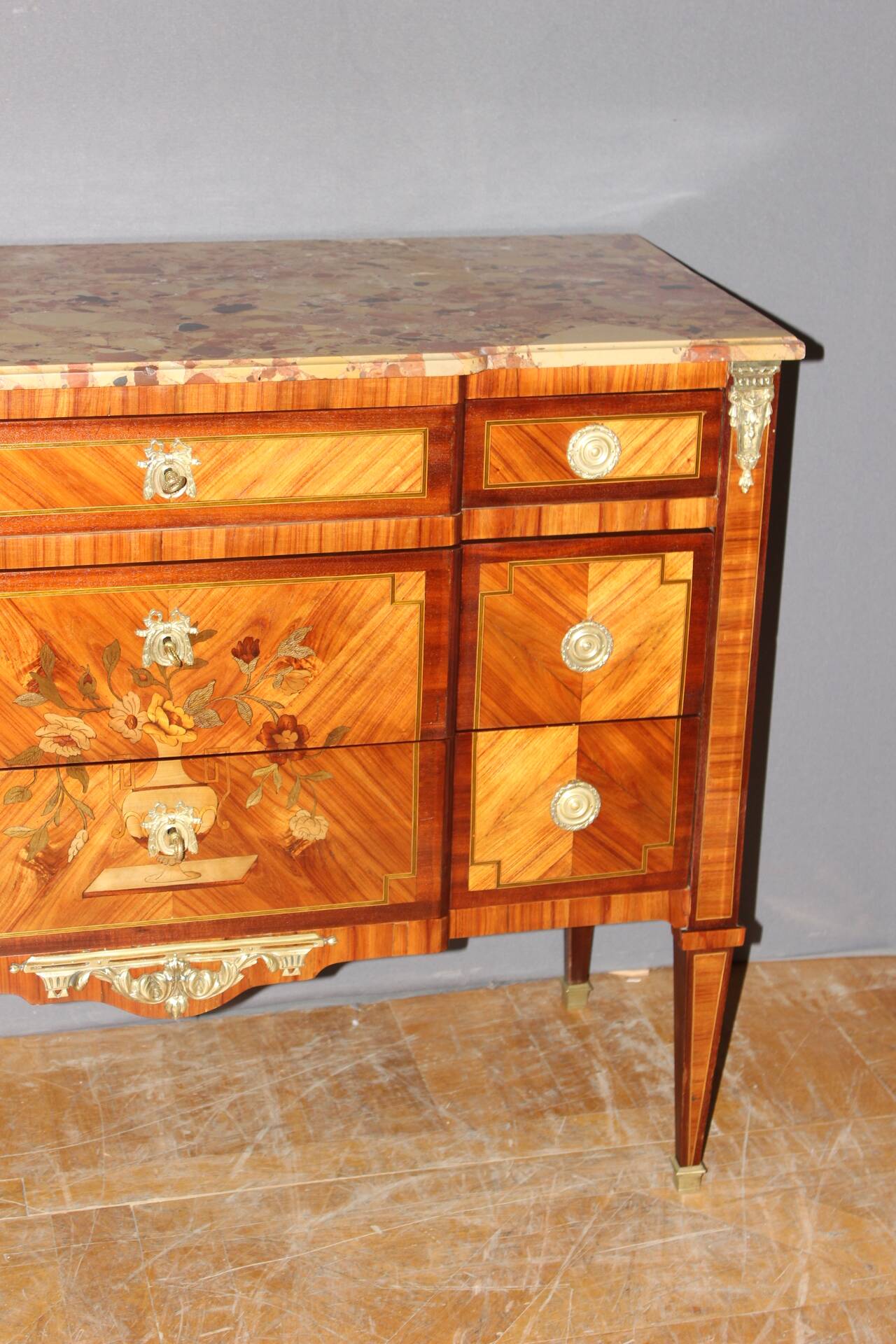 Louis XVI style commode in marquetry from around 1940.