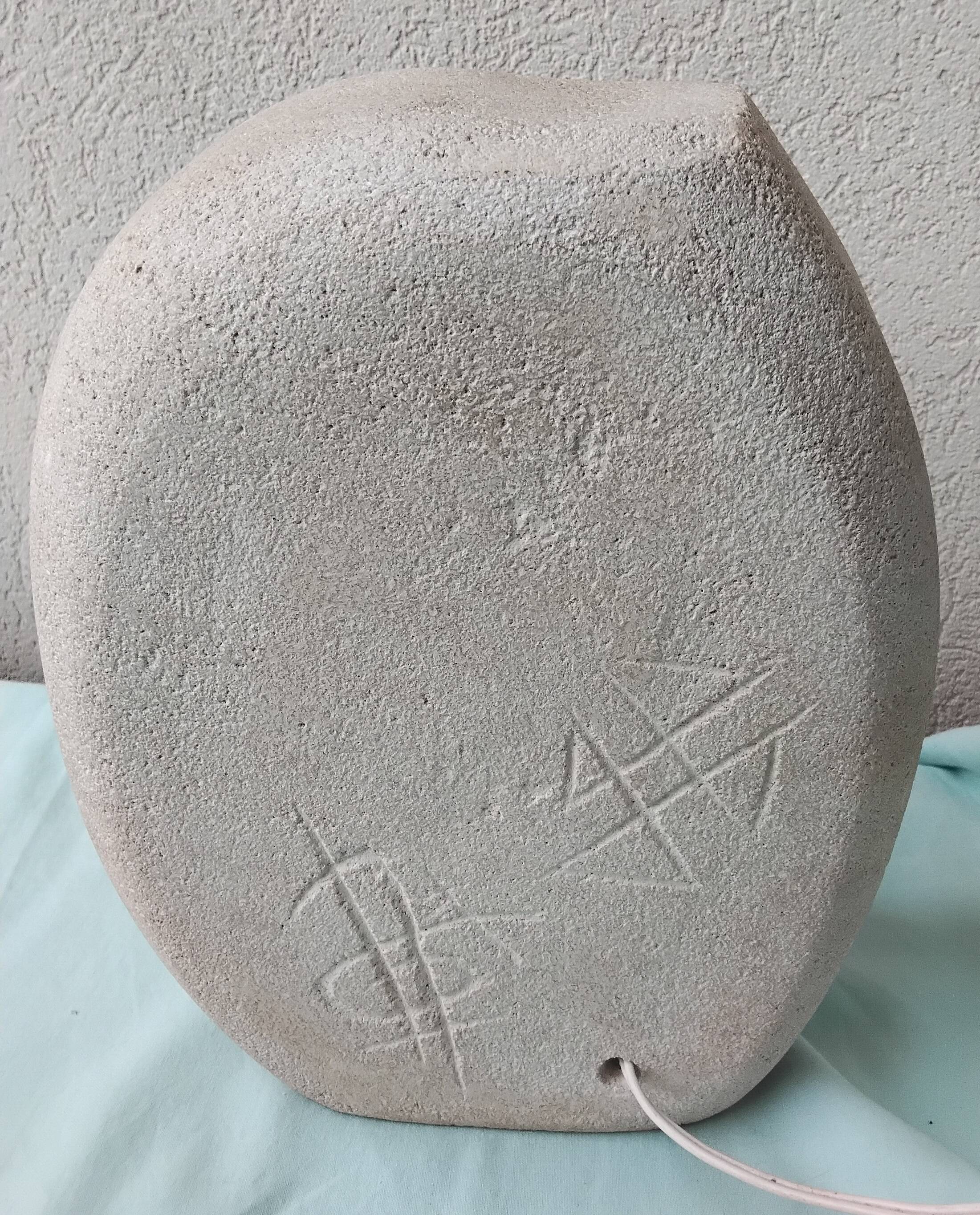 Sculpted stone lamp by Arsène Galisson