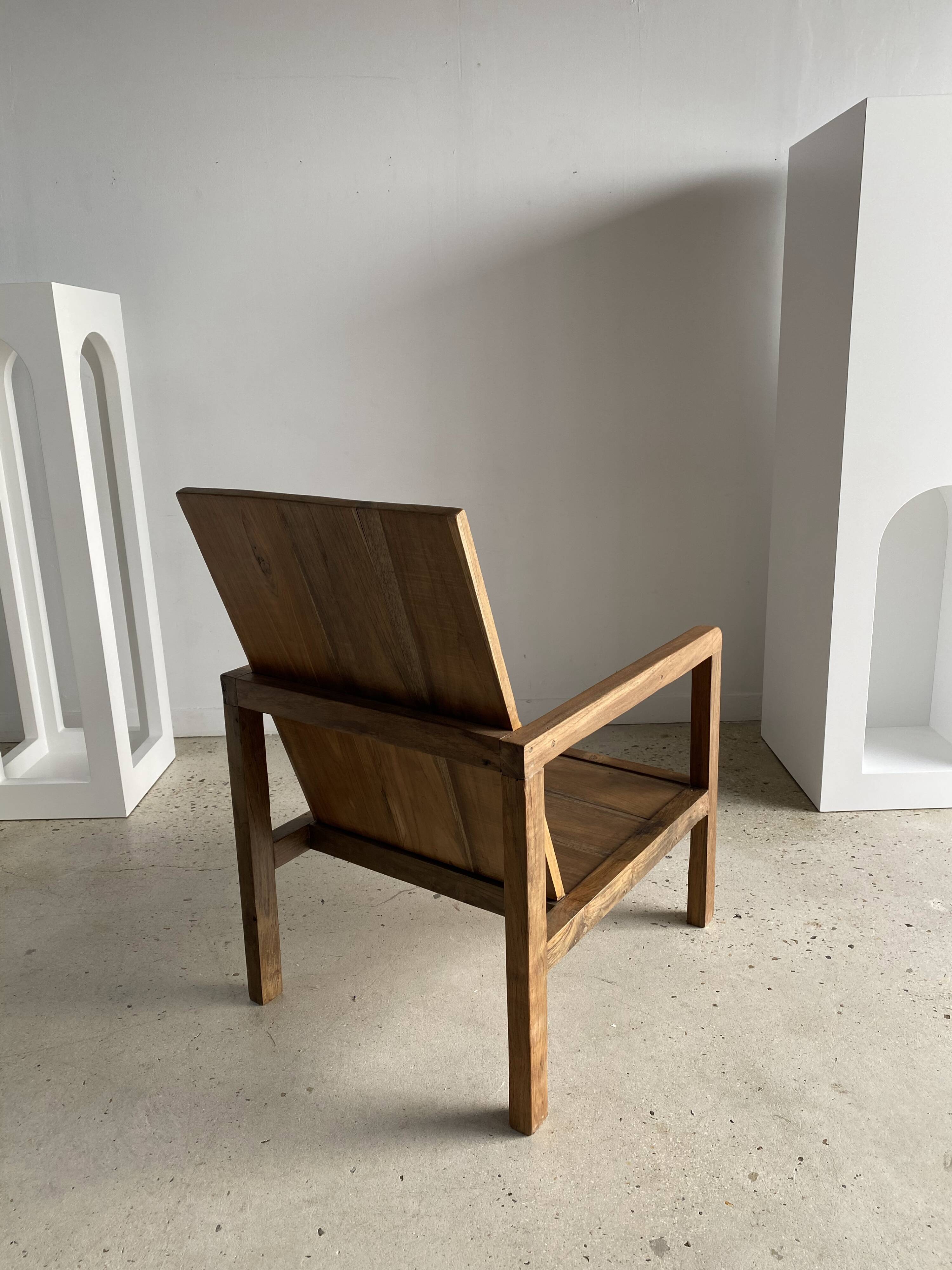 Armchair in natural wood (teak) minimalist design