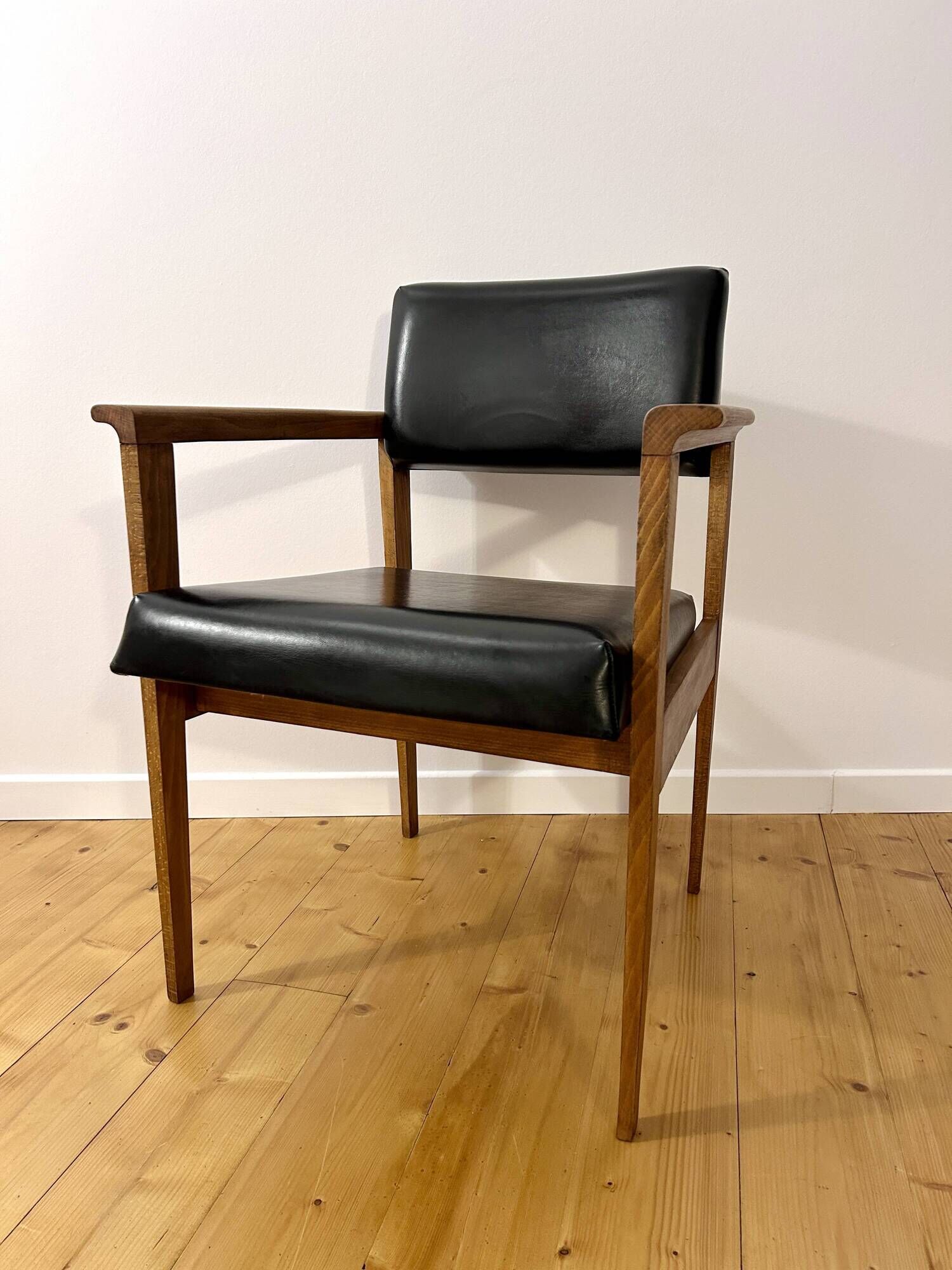 Mid-Century faux leather and wood armchair