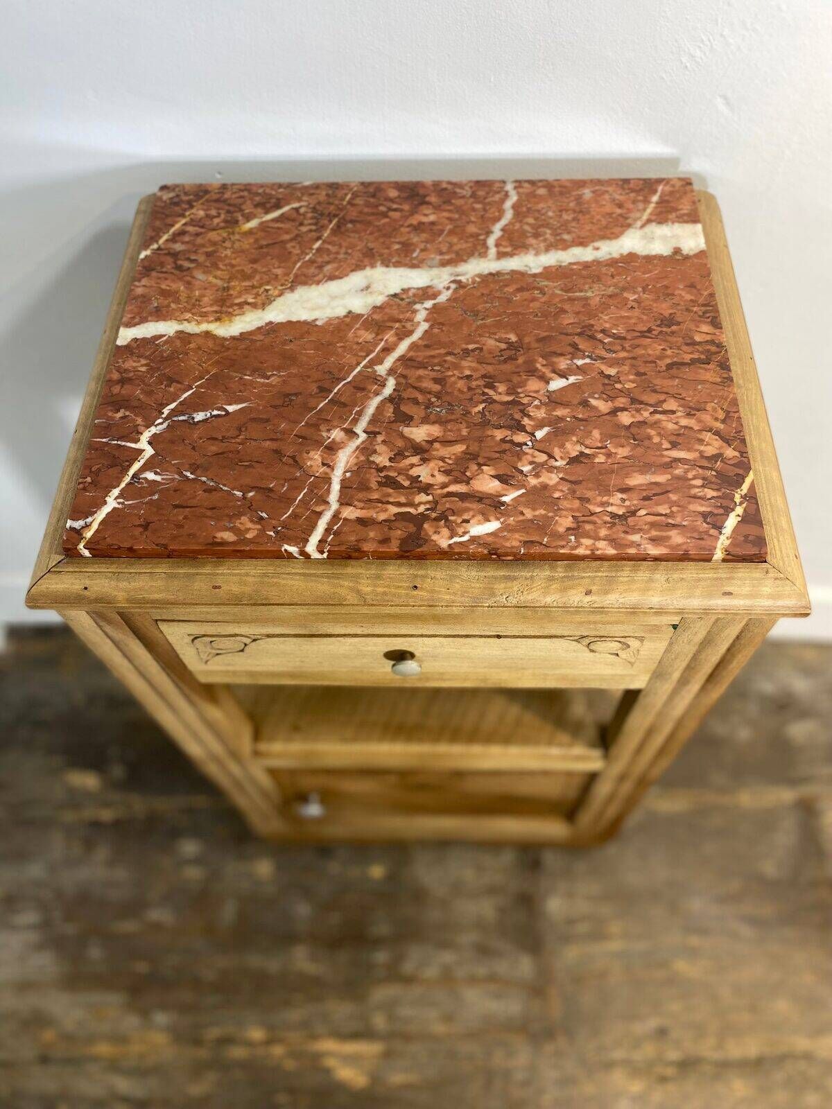 Provincial antique bedside table in walnut, with a red marble top.
