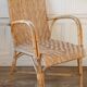 High-backed adult rattan armchair, circa 1960