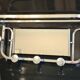 Nickel-plated Art Deco wall-mounted coat rack with swivel mirror