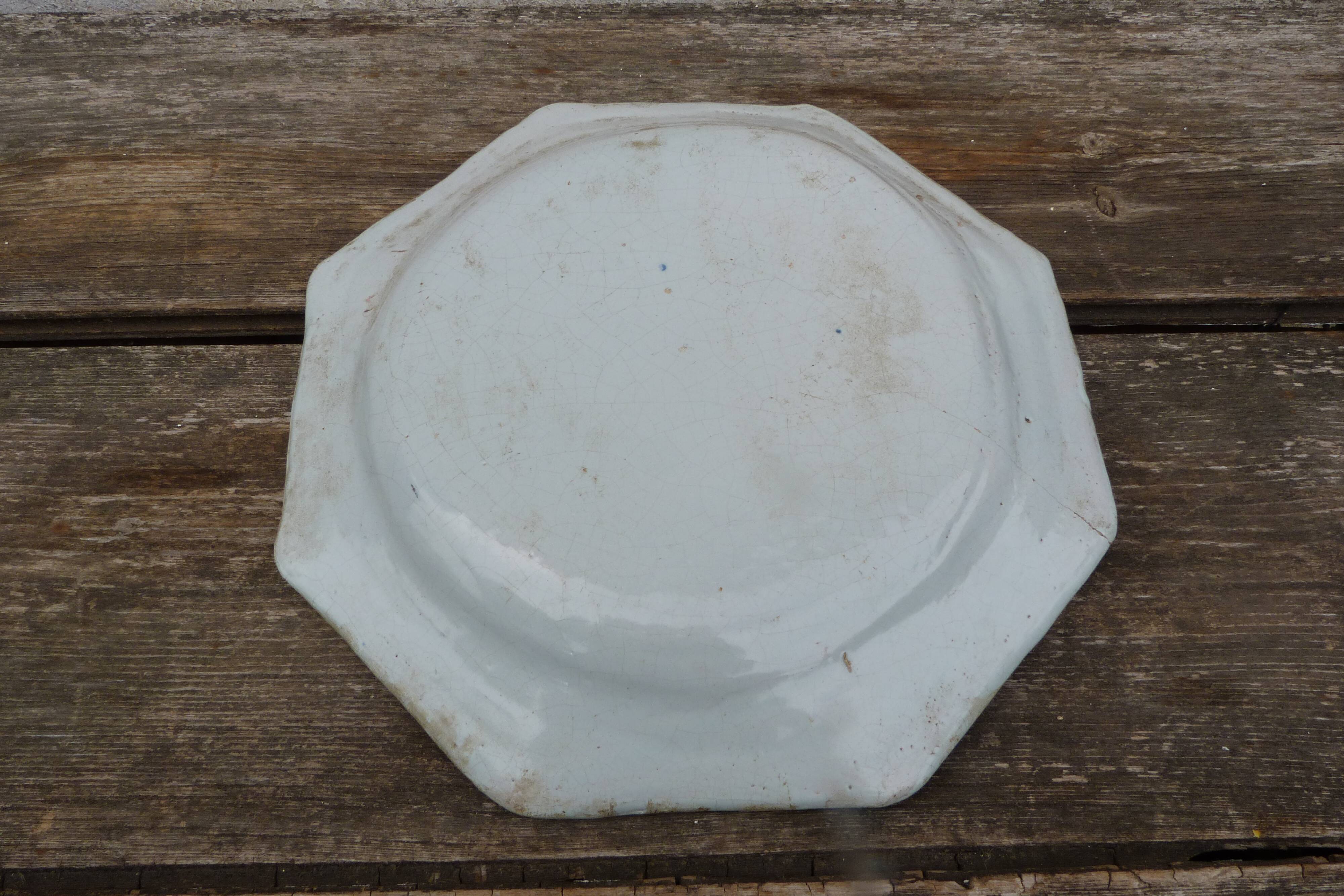 Large octagonal antique plate in Rouen faience.