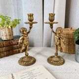 Pair of bronze “Cherubim” candlesticks