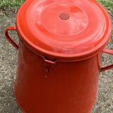 Red enamelled metal bin from the 1950s, with a lockable lid and side handles.