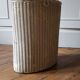 White lacquered wicker laundry box