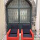 Pair of vintage black and red armchairs from the 1960s.