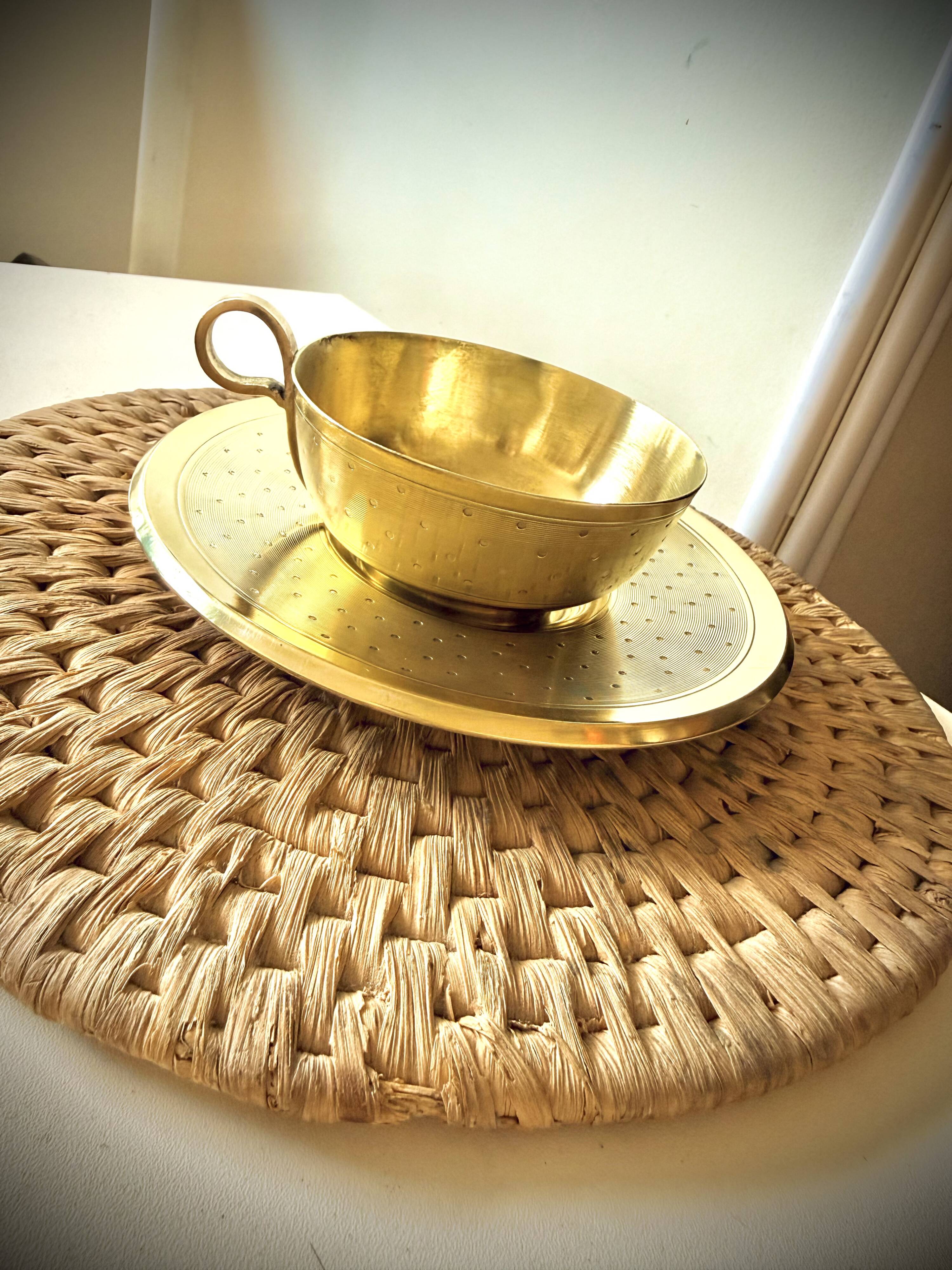 Cup and saucer in brass Saint Médard (18th century)