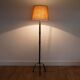 Hammered iron floor lamp in the style of Marolles