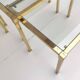 Brass and glass trundle tables