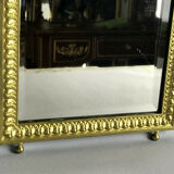 Old gilded bronze mirror in Louis XVI style with beveled mirror 37x23,5cm