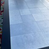 Vintage coffee table in stainless steel and black lacquered wood.