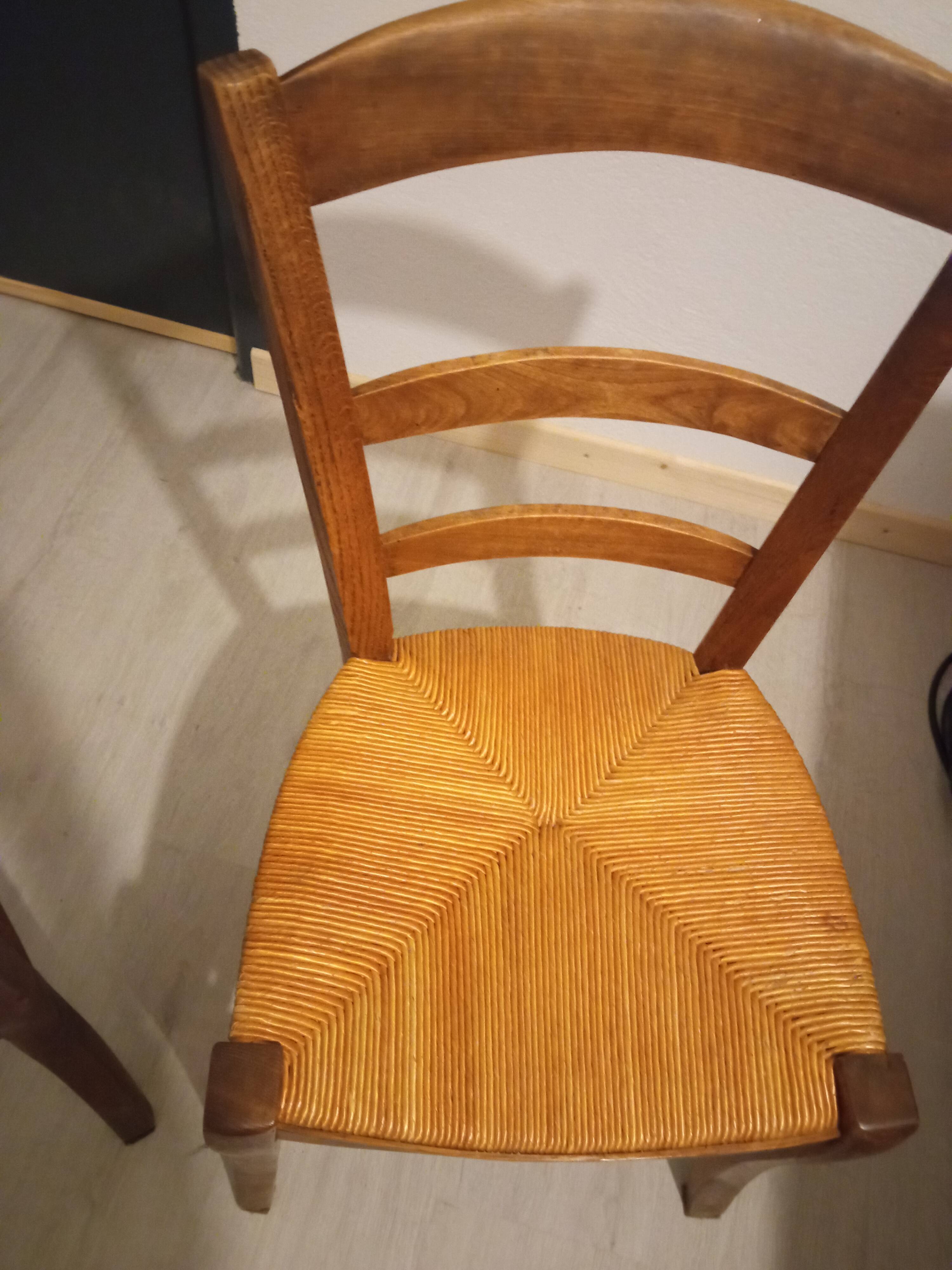 Pair of vintage wooden and woven straw chairs