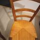Pair of vintage wooden and woven straw chairs