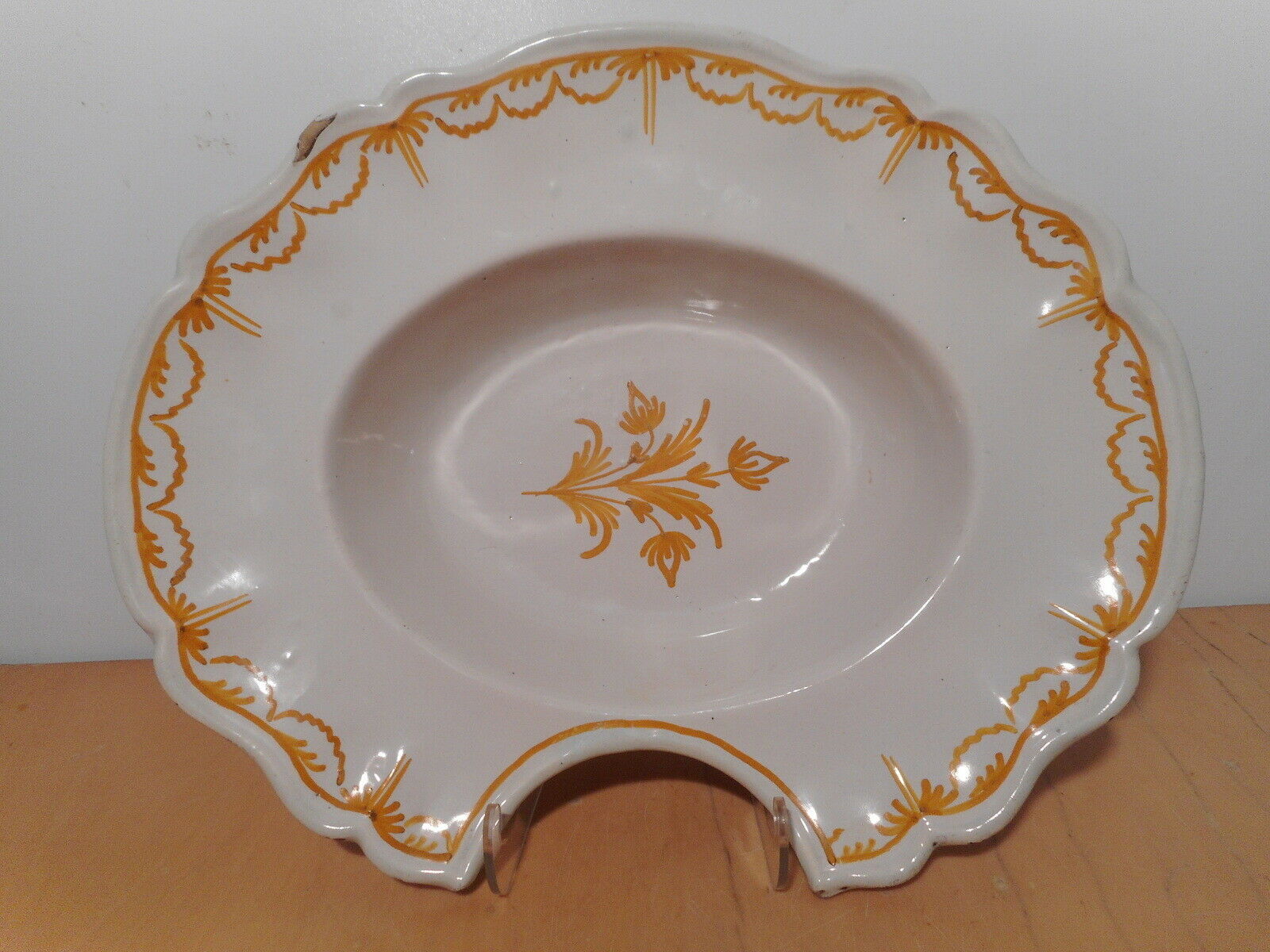 Old beard dish in faience of the south of the France 18 century in yellow camaieu