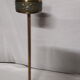 Gold metal standing ashtray and black marble base