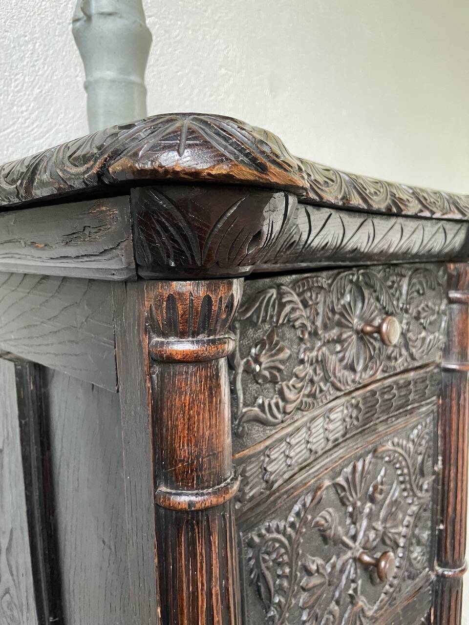 19th century chest of drawers in carved blackened pine