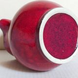 Vintage red enamel ceramic pitcher