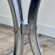 Vintage 1970s round metal and smoked glass table