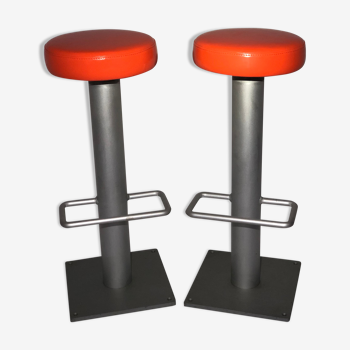 Pair of contemporary stools 2000 in orange vinyl