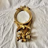 Vintage Empire style wall mirror in gold resin